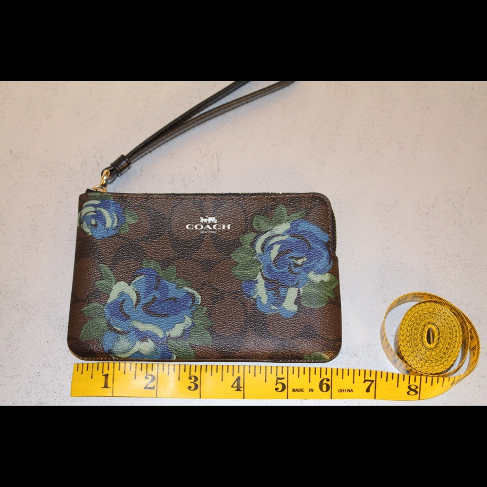 Coach Signature Floral Wristlet